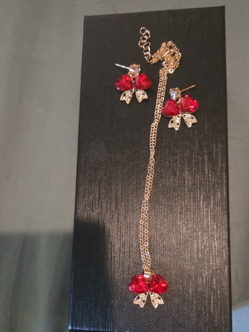Gold-Tone Necklace & Earring Set with Red Crystal Bow Accents